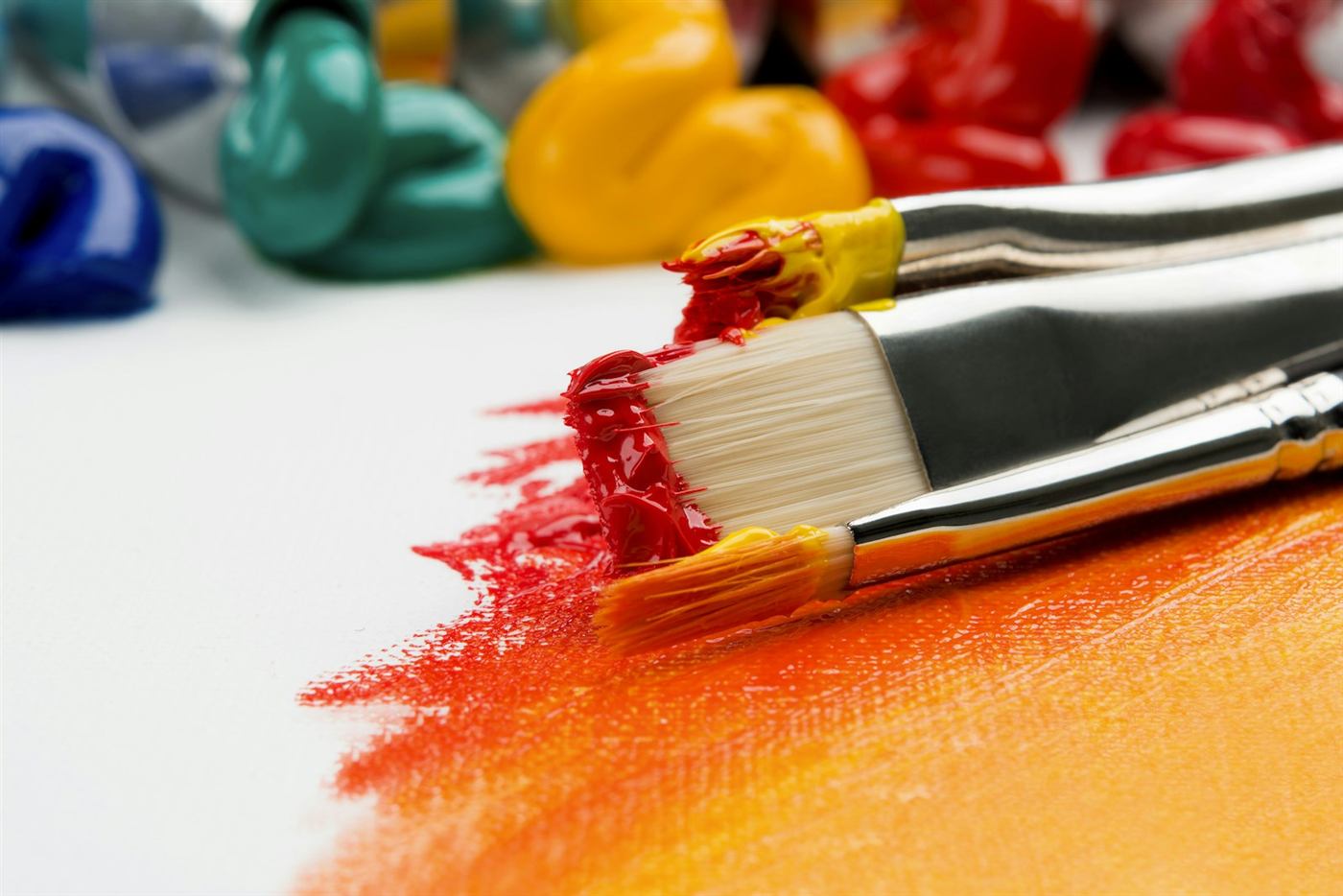 Colourful art materials arranged on a table