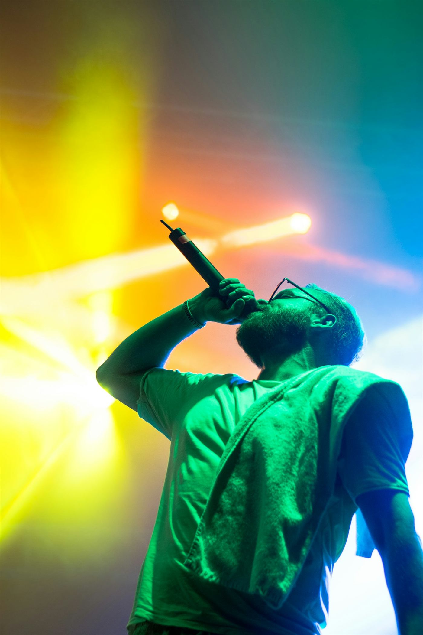 A vocalist performing with expressive focus
