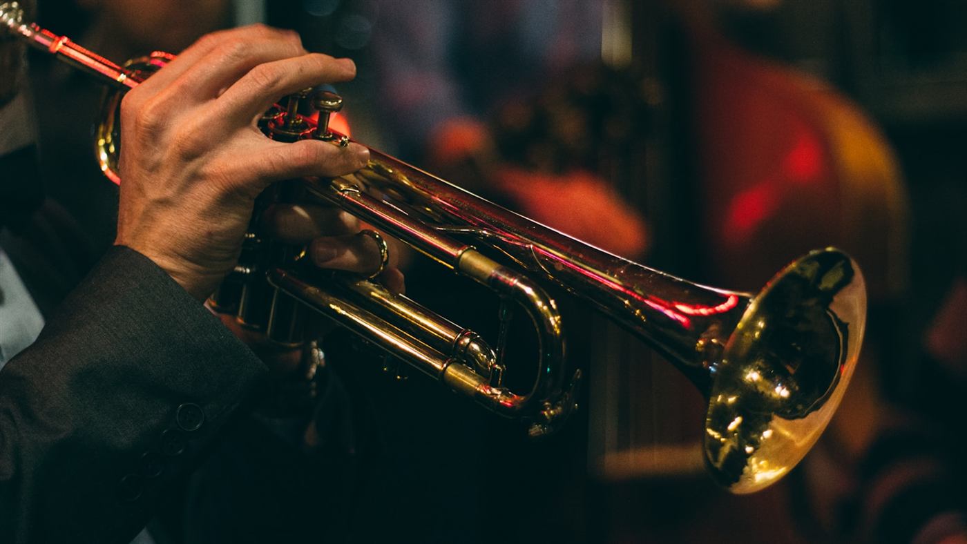 A musician performing on a wind instrument